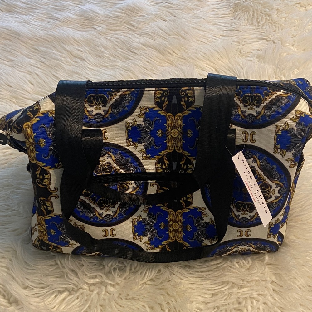Alice+ Olivia Duffle Bag  Elegant Blue Tan color zipper two pockets on each side